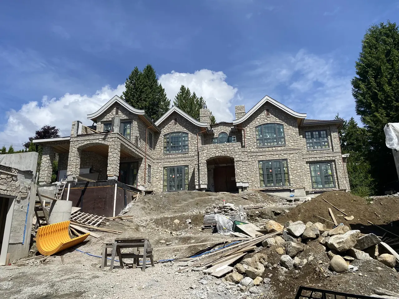 Large custom home under construction before its insulation installation.