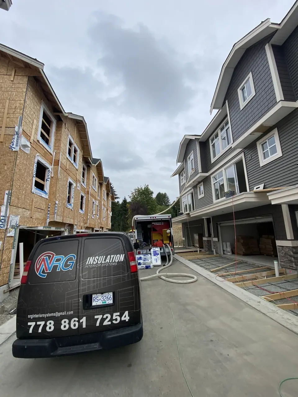 NRG service van at a multi-unit townhouse construction project.