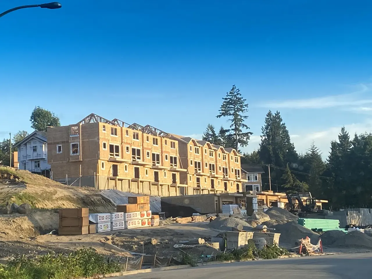 Multi-family residential building framed and ready for envelope installation.
